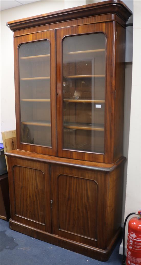 A Victorian mahogany glazed bookcase cabinet W.124cm